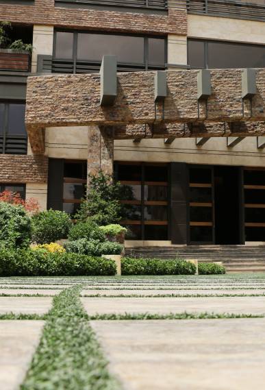 The top floor of this modern building is a single-unit penthouse. Two floors under the 3  top floor each include two units, and other floors have 3 or 4 units. 